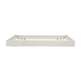 Lit gigogne FLEXA, bois blanc, 90 x 190 cm, vue de face sur fond blanc. Bords sécurisés pour les enfants visibles.
