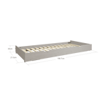 Structure de lit gigogne FLEXA de couleur grise, avec des bords arrondis visibles garantissant la sécurité des enfants, photographiée sur un fond blanc uni.