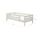 FLEXA single bed with safety rail, CLASSIC collection, white pinewood, child-safe edges, shown in a child’s bedroom.