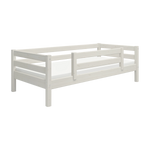 FLEXA CLASSIC white pine single bed with safety rail, shown in a childs room against a white backdrop.