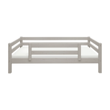 BARRIÈRE DE SÉCURITÉ FLEXA de couleur grise, vue de face, conception sécurisée pour la chambre denfant, sur un fond blanc uni.