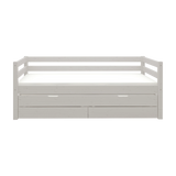 FLEXA-Einzelbett aus der CLASSIC-Serie in grauer Holzoptik, mit Ausziehbett, Schubladen und Sicherheitsgitter, vor einfarbigem Hintergrund.